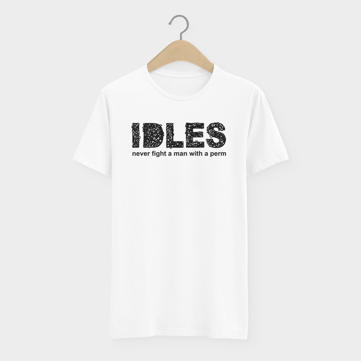 Nome do produto: Camiseta Idles  Never Fight A Man With A Perm  Post Punk 