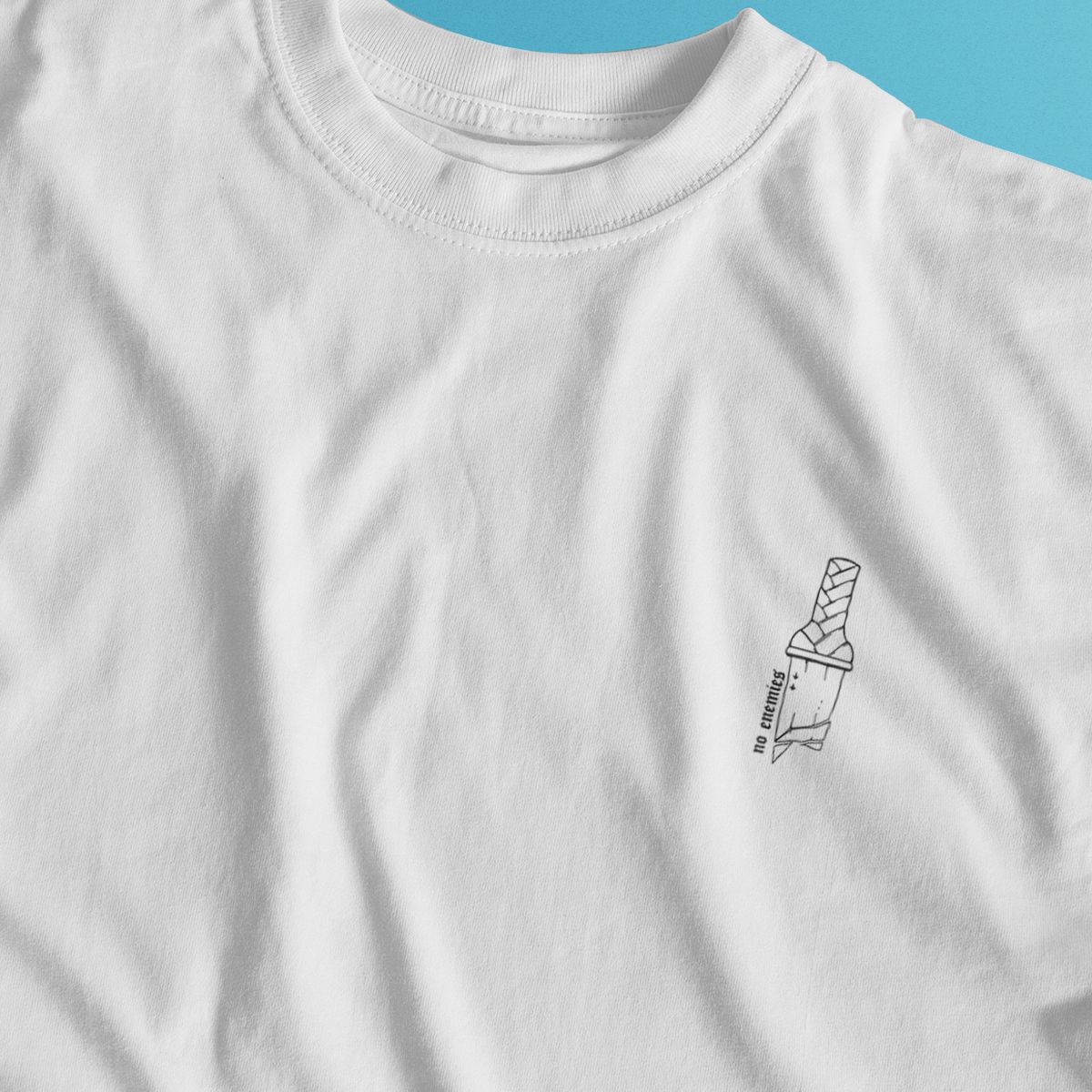 Nome do produto: Camiseta Minimalista Branca - No Enemies